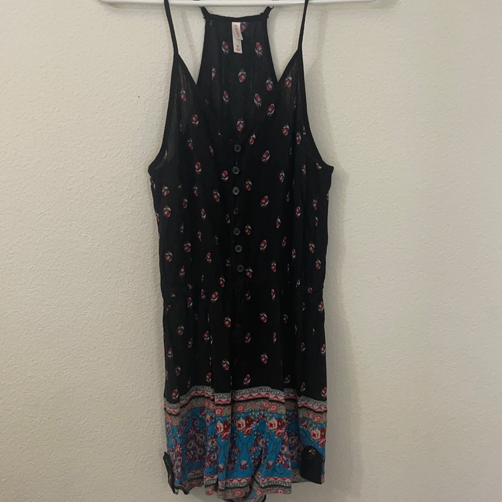 Size M xhilaration romper with buttons, flower print.